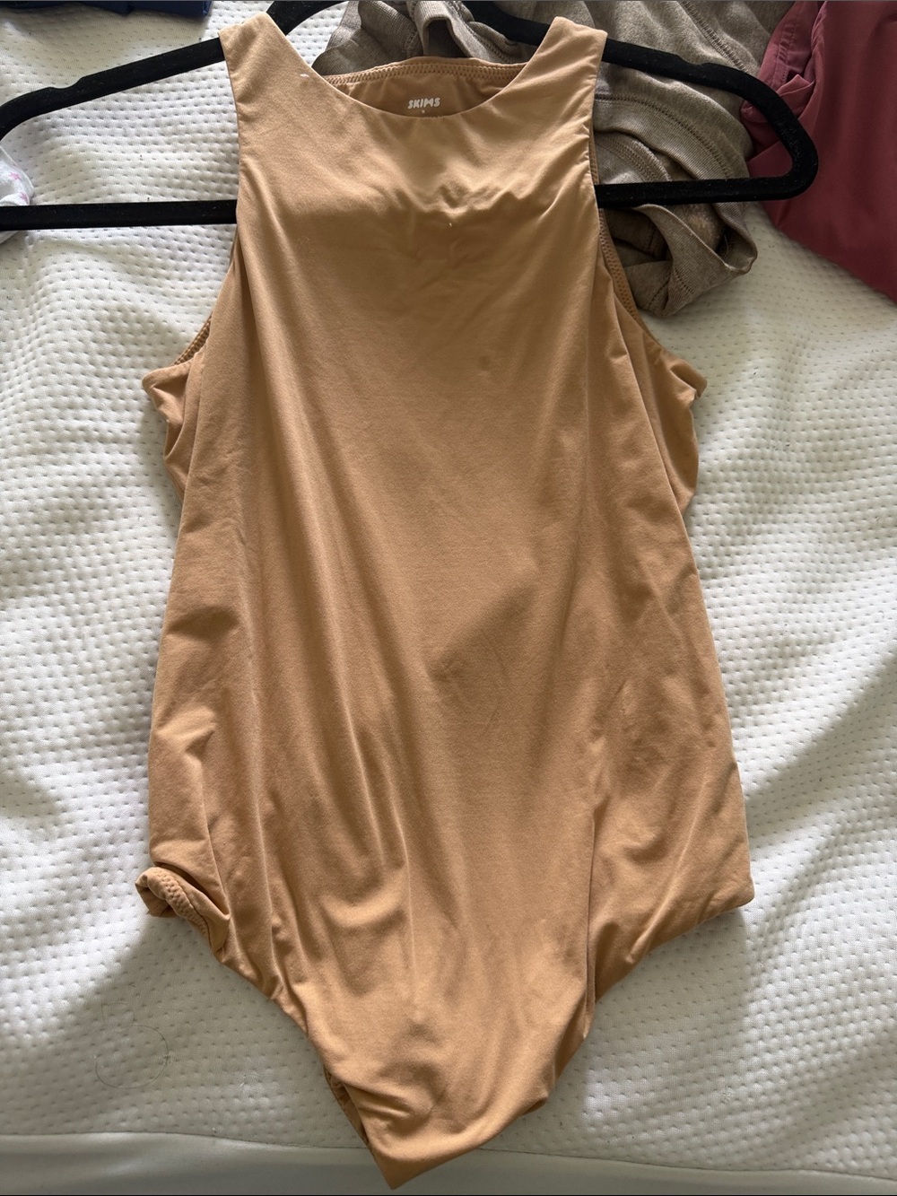 SKIMS Seamless High-Neck Bodysuit in Tan